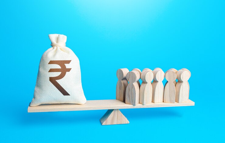 फोटो group of people and indian rupee sterling money bag on weight scales staff maintenance