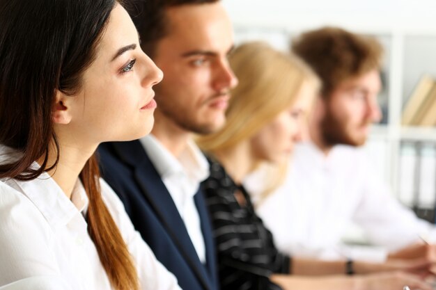 Group of people listen carefully during seminar