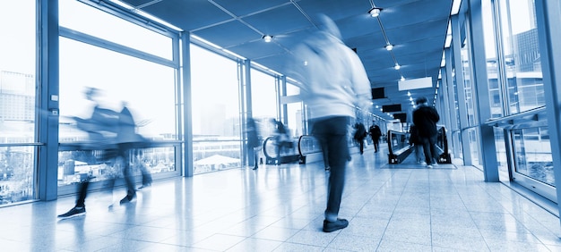 Group of people in the lobby of a airport