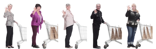 Group of people in profile with shopping cart isolated