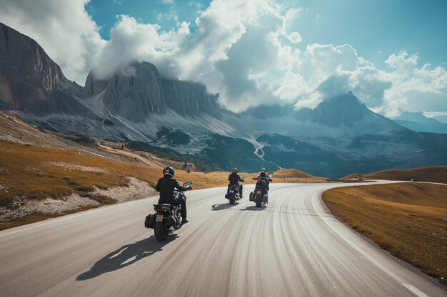 Photo group of people riding motorcycles on a road