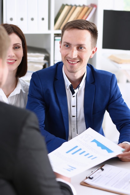 Photo group of people sit in office deliberate on problem