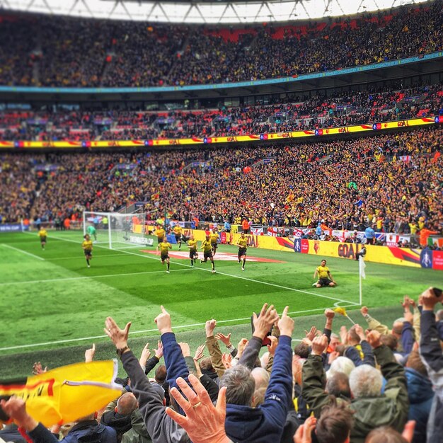 Group of people in stadium