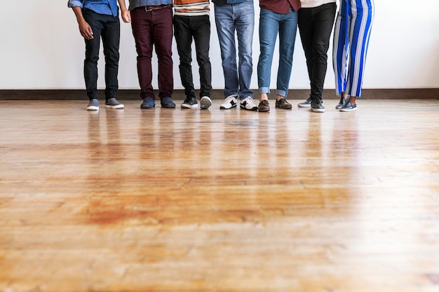 Group of people standing in a row