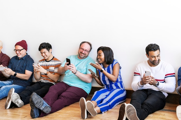 Group of people using mobile phones