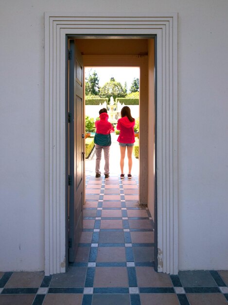 Group of people walking in garden