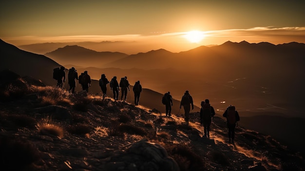 A group of people walking on a mountain with the sun setting behind them