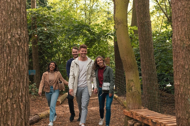 Group of people walking in park on week end