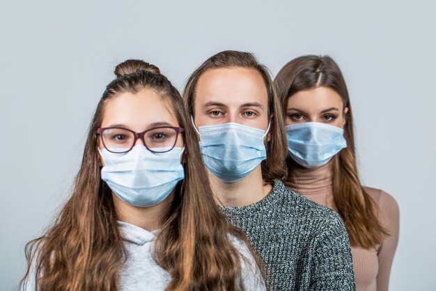 Group of people wearing protective medical mask for protection from virus disease Group of people with protective masks