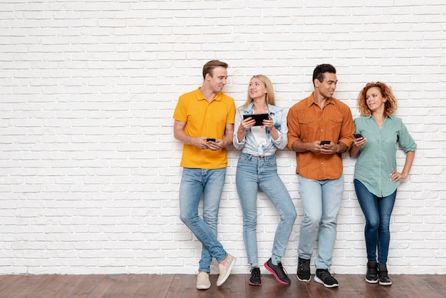 Group of people with electronic devices