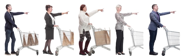 A group of people with a shopping cart point their fingers in front of them