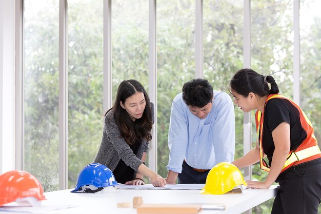 Group of people working on table