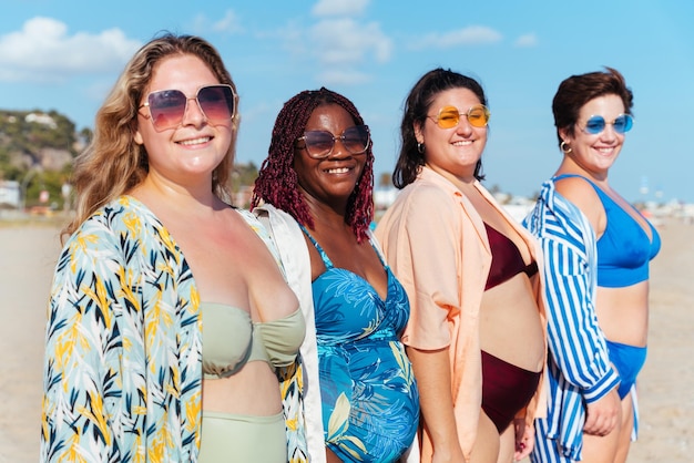 Group of plus size women with swimwear at the beach