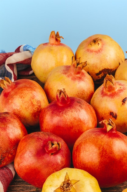 Group of pomegranate fruits close up background