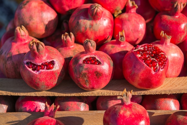 Group of pomegranates. Pomegranate closeup fruit background