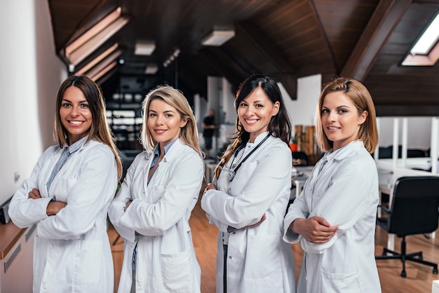 Group portrait of beautiful female medical team.