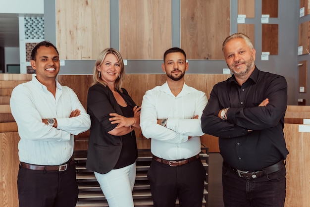 Photo group portrait of happy diverse colleagues of different ages united businesspeople of 30s and 50s looking at camera team of trainee interns and coaches posing together in office teamwork concept