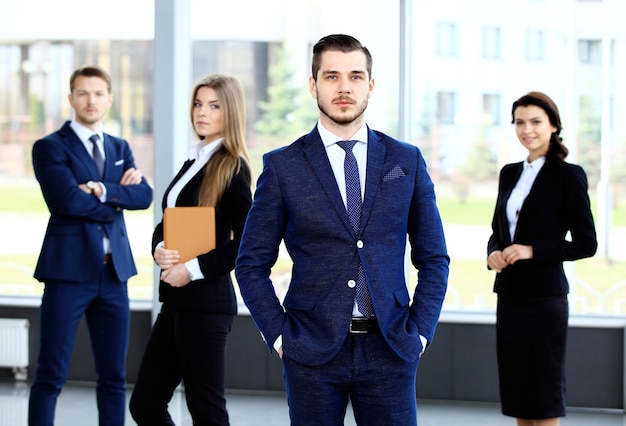 Group portrait of a professional business team looking confidently at camera