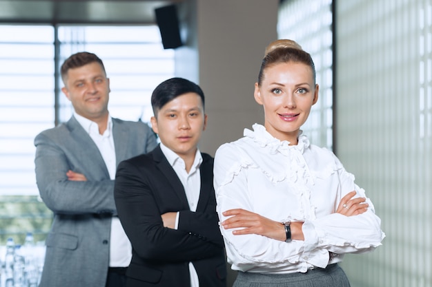 Group portrait of a professional business team looking confidently at camera