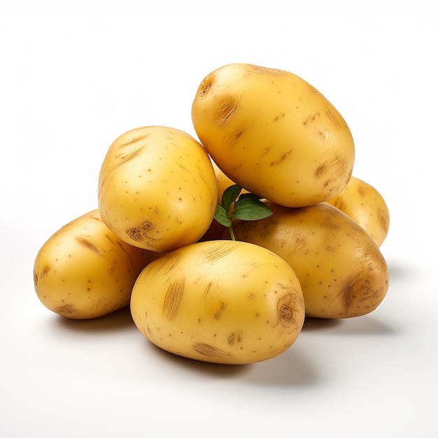 a group of potatoes with a green leaf on top of them.