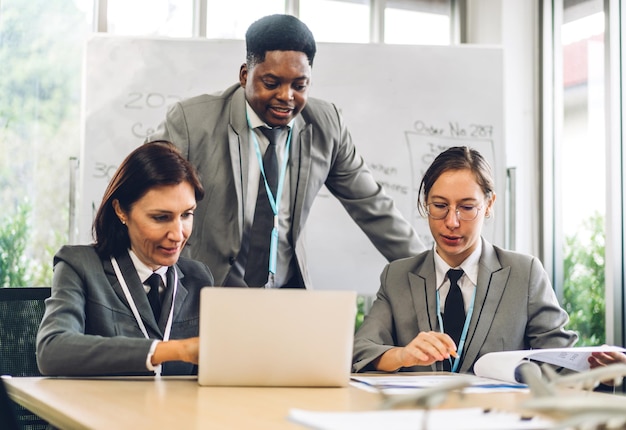 Group of professional business meeting and discussing strategy with new startup project.Creative african american man planning and brainstorm with laptop computer in modern office.Teamwork