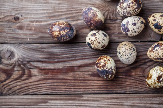 Group of quail eggs on thewooden background