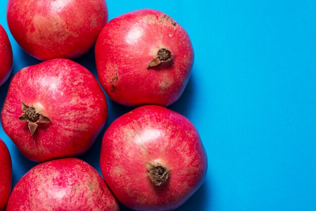 Group of red garnets on blue background