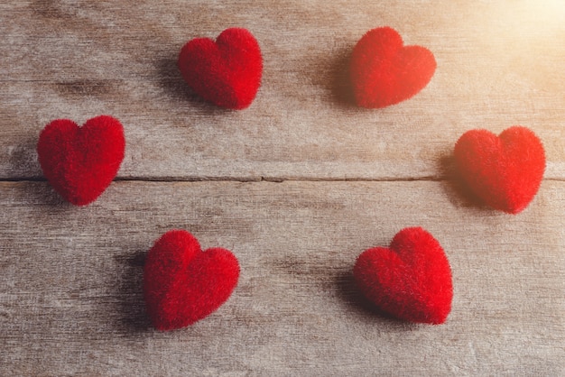 Group of Red heart on a wooden background