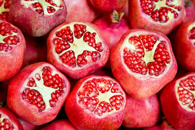 Group of ripe opened pomegranates