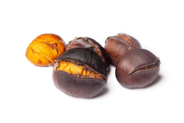 A group of roasted chestnuts on the white background