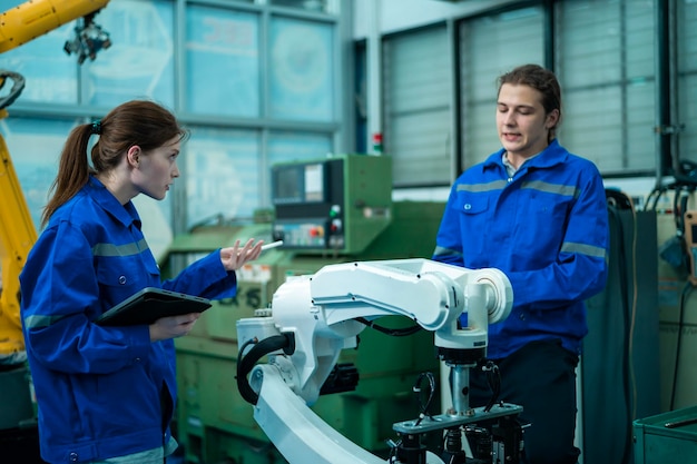 A group of Robotics engineers working with Programming and Manipulating Robot Hand