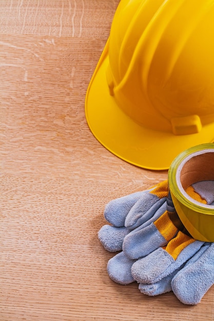 Group of safety working tools on wooden brown board construction concept