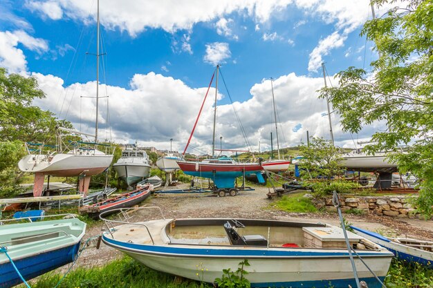 Group of sailing boats in a shipyard in clifden harbor in the province of connacht ireland