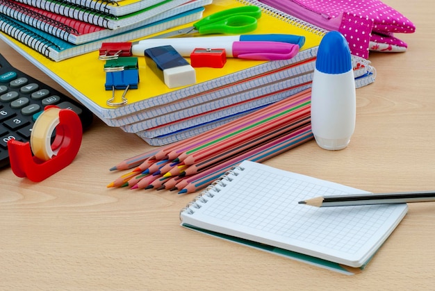 Group of school supplies and books