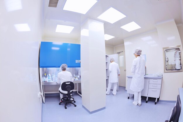 group of scientists working at the laboratory