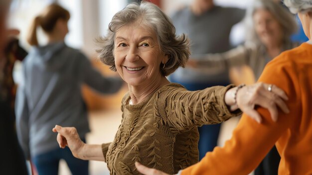 A group of seniors are dancing in a circle They are all smiling and having a good time The woman in the front is looking at the camera and smiling