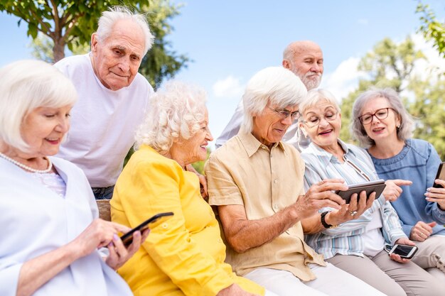 Group of seniors people bonding at the park