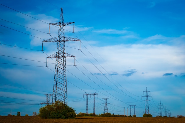 Group silhouette of transmission towers 