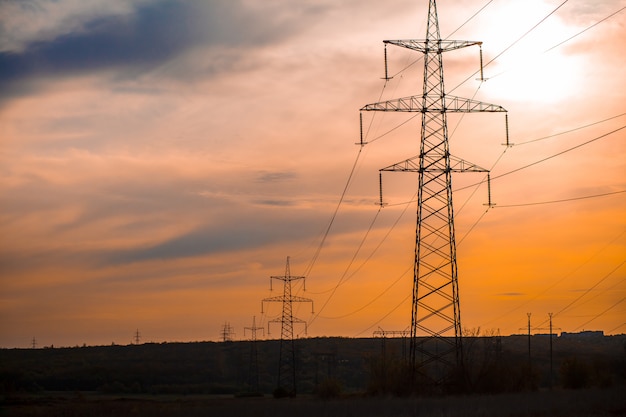 Group silhouette of transmission towers 