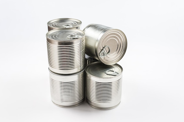 Group of silver canned food on white background