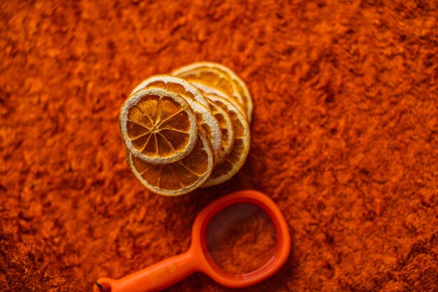 Group of slices oranges on orange backgroundtop view