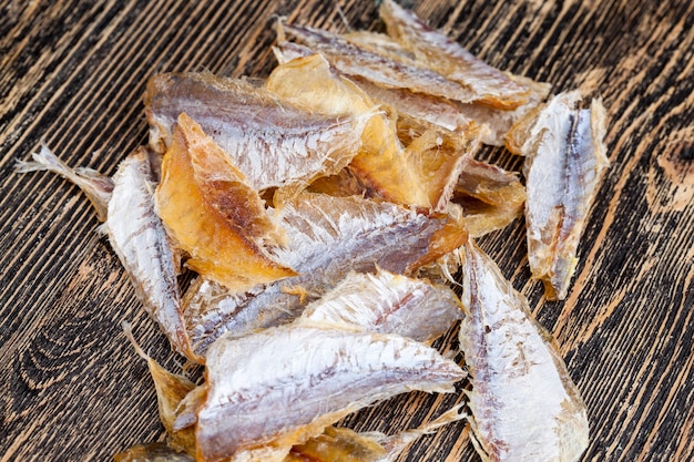 Photo group of small fish gutted and dried with salt, dried and butchered small fish