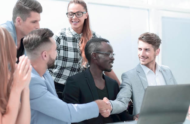 Group of smiling multicultural business partners