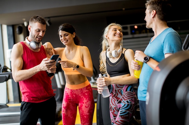 Group of sporty young people at the gym