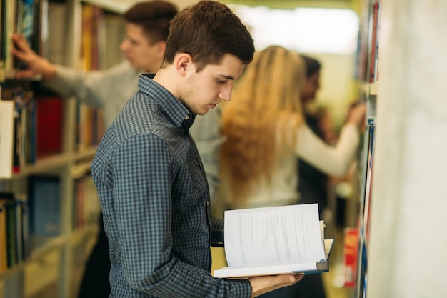 Group of student want to find some helpful literature to preparing for university exam