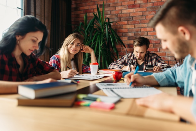 Group of students studying at the table