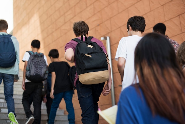 Group of students walking in the school