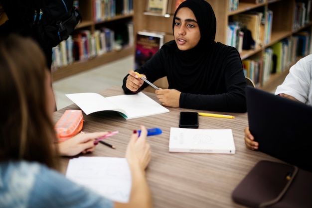 A group of students working in the library 