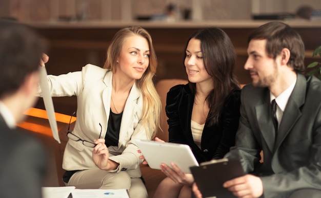 A group of successful businessmen. Discussion of the important contract of the company.