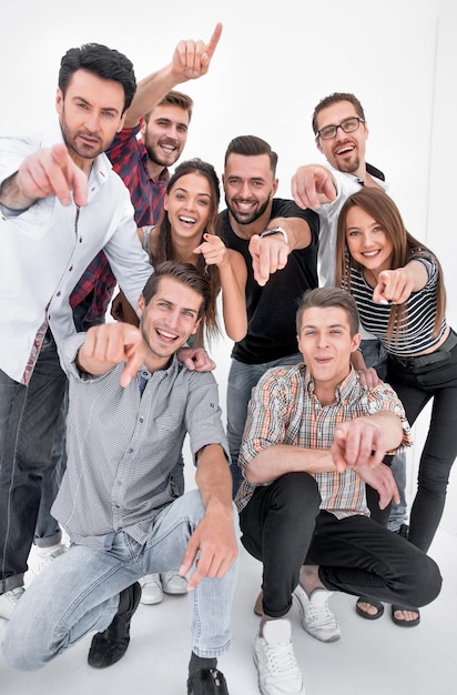 Group of successful young men pointing at you